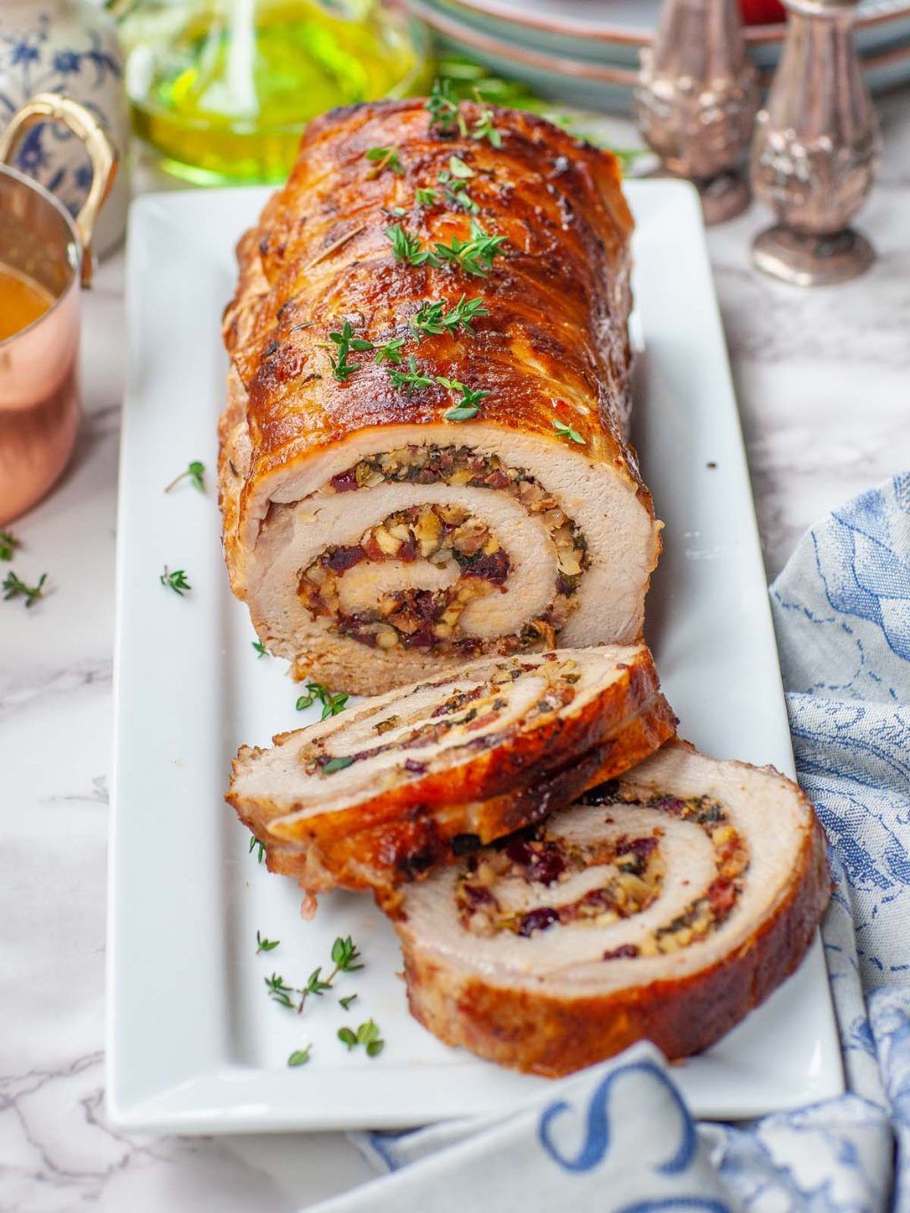Herb-Crusted Pork Loin Roast Stuffed with Apples and Onions