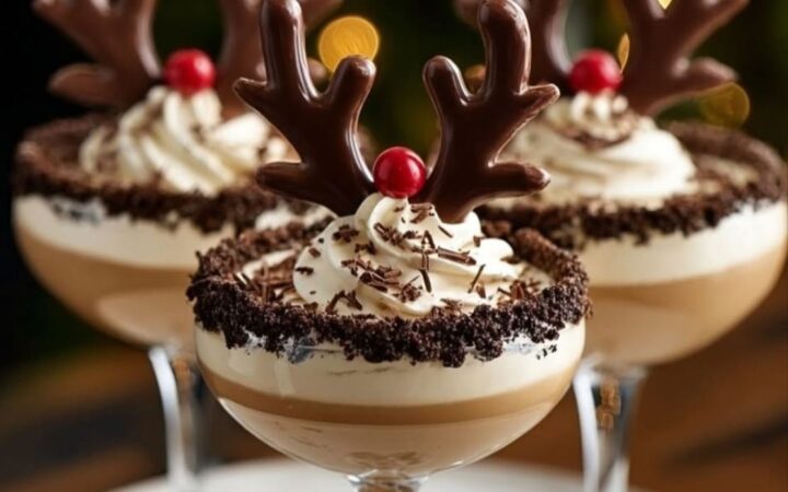 two desserts with reindeer antlers on a plate